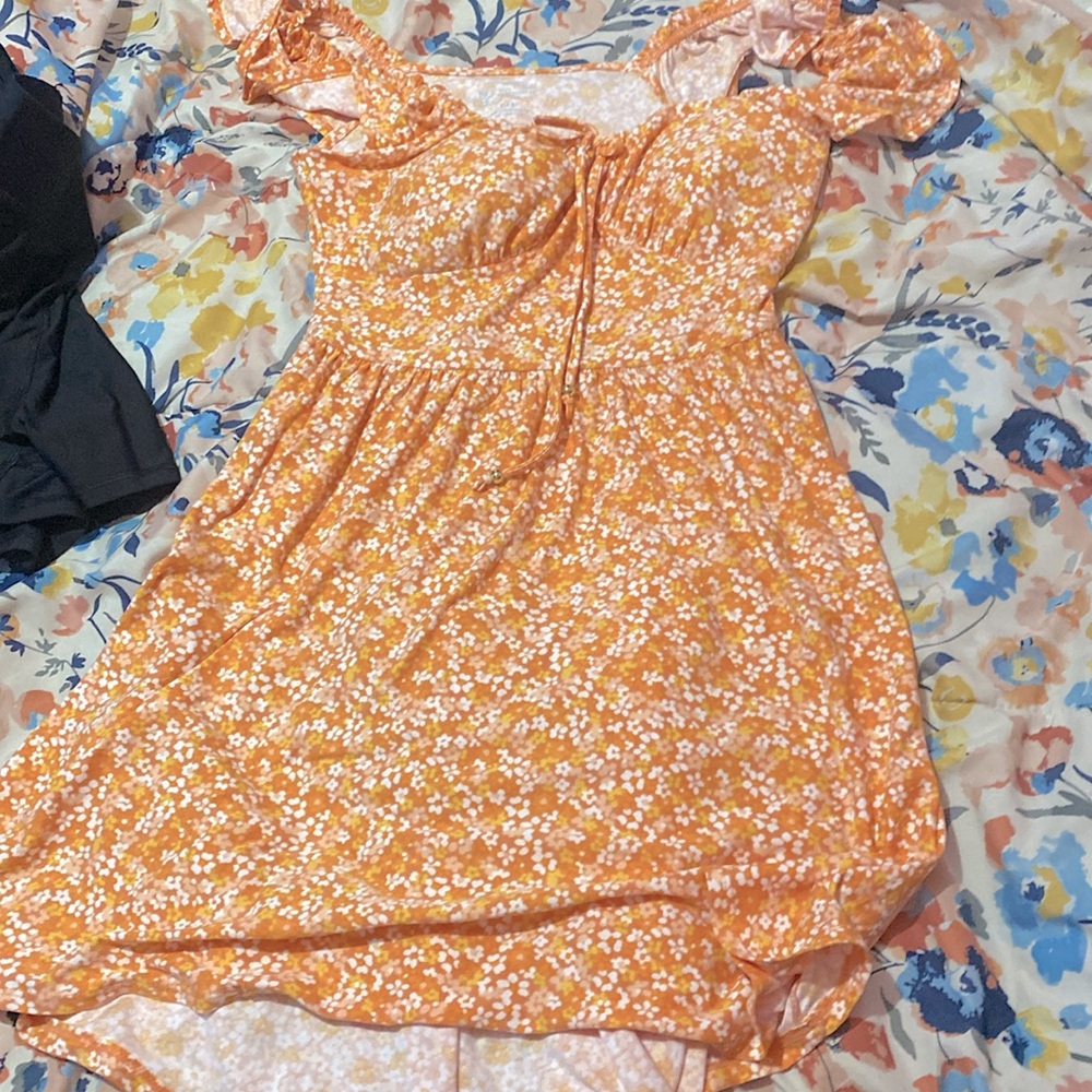Dress size small 3-5  color orange with flowers
